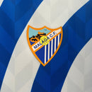 Camisa Malaga Edição Especial 2024/25 - Hummel Torcedor Masculina - Branca/Azul